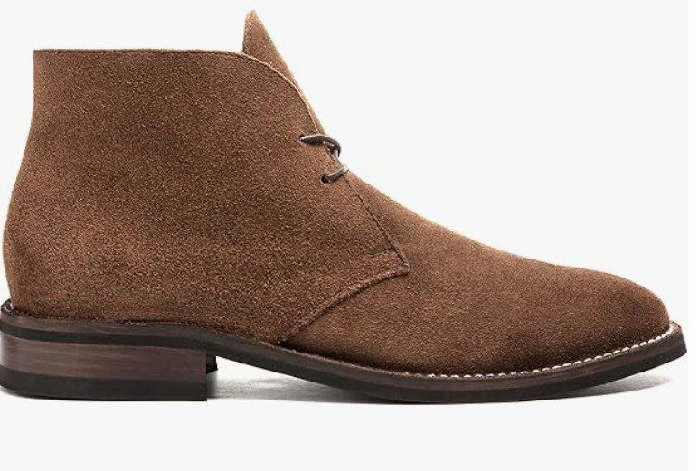 a pair of brown Thursday boot Co boots