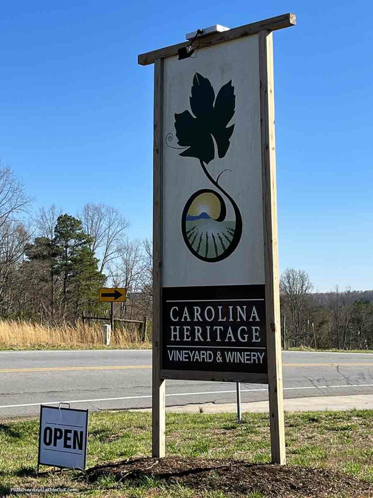 a sign at the entrance of the Carolina Heritage Vineyard & Winery