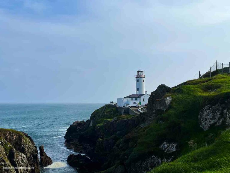 a lighthouse on a rocky coastline