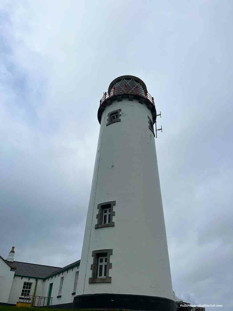 a view of a lighthouse from the ground