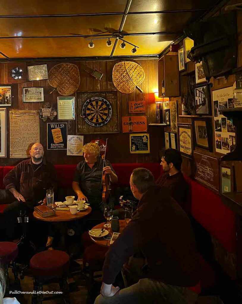 a group of musicians in an Irish pub