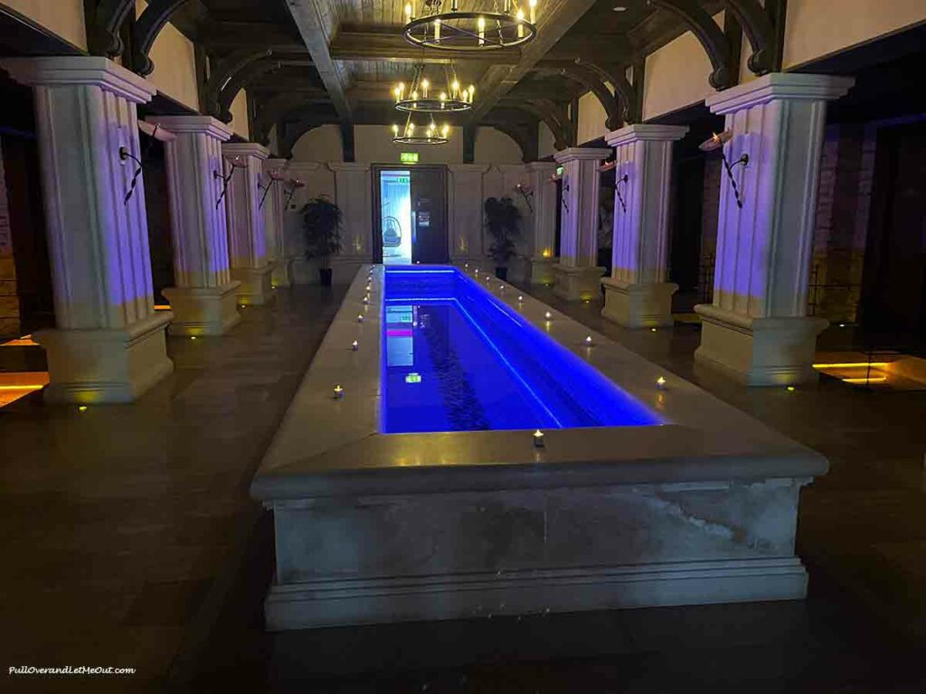 a lighted pool at a spa