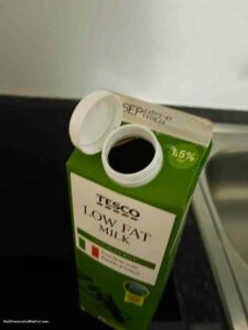 milk carton cap that is attached