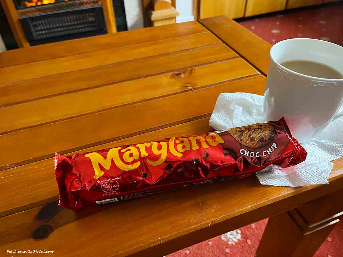 a packet of biscuits and a cup of tea